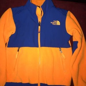 orange and blue north face jacket